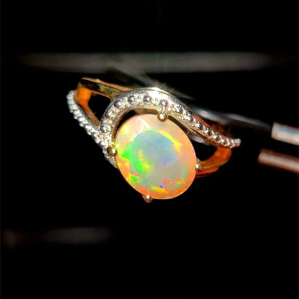 10K‎ Oval Shaped Opal/Diamonds Ring